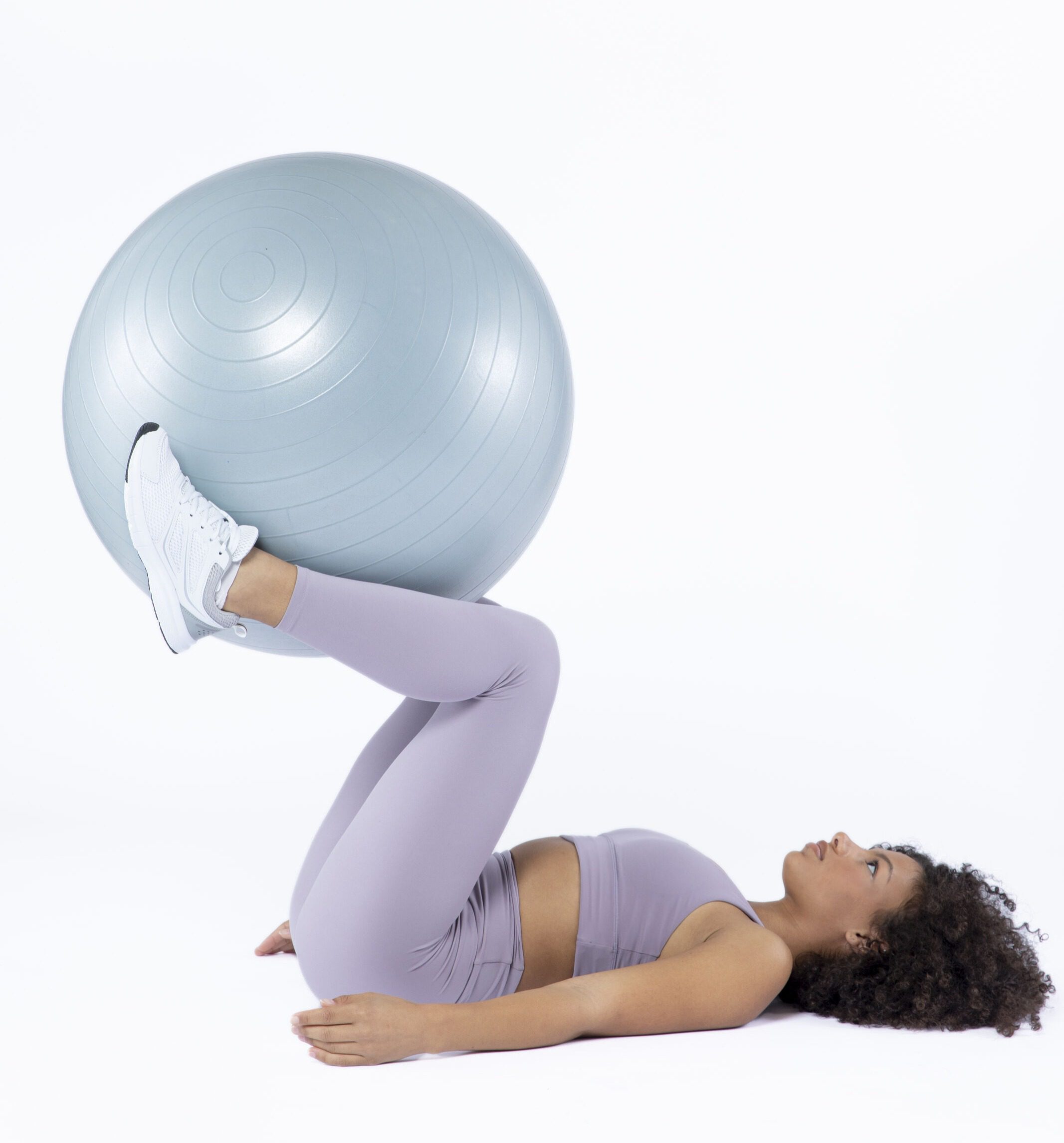Woman Training with Gym Ball